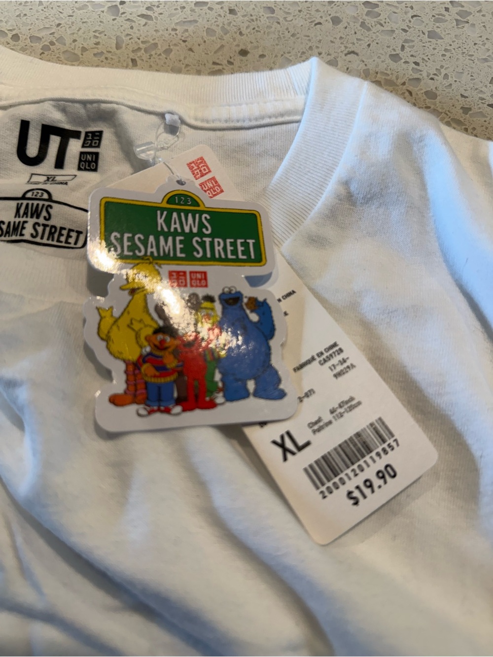 Uniqlo White KAWS x Sesame Street Graphic Tee with Colorful Characters